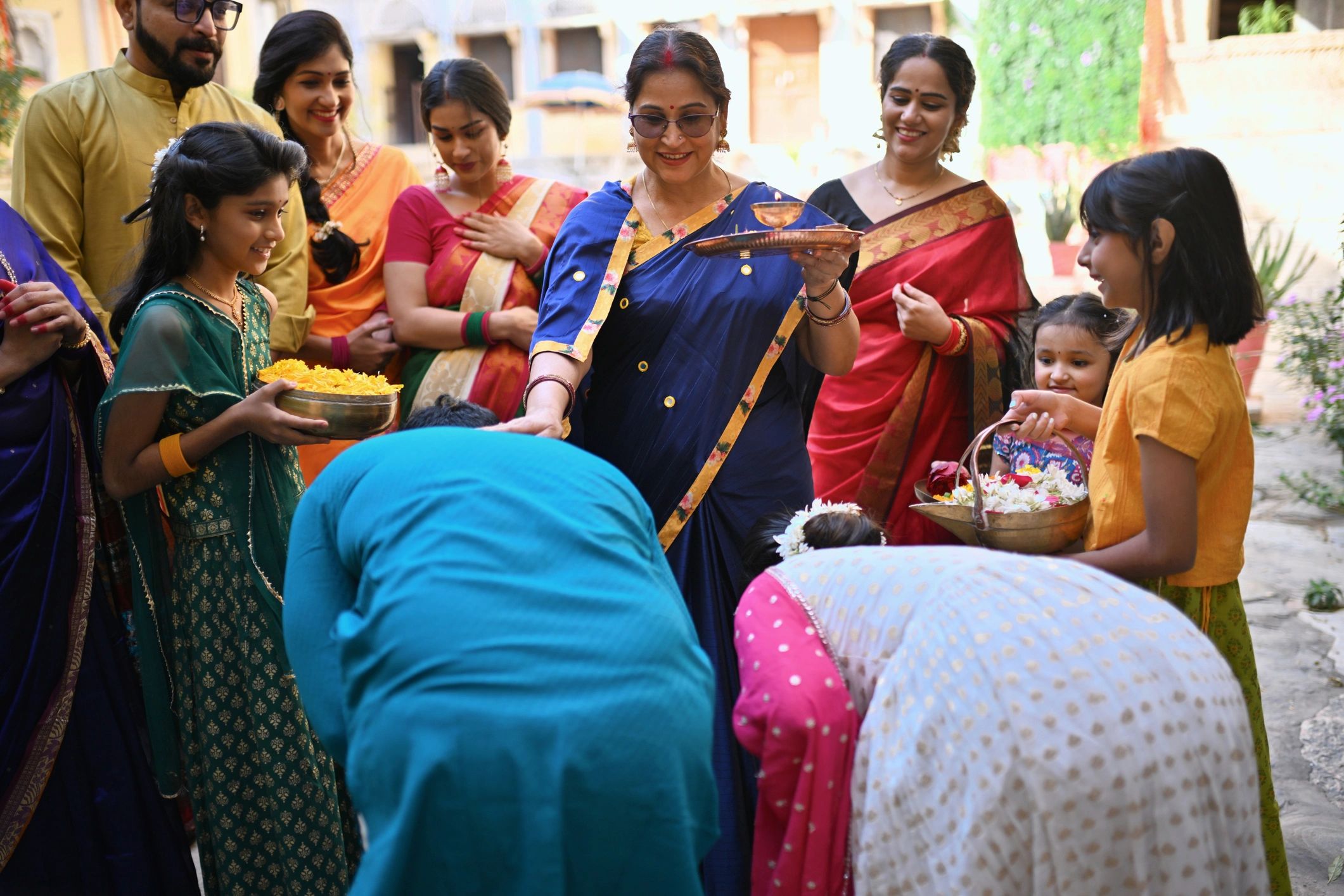 Emotional family blessing during wedding celebration