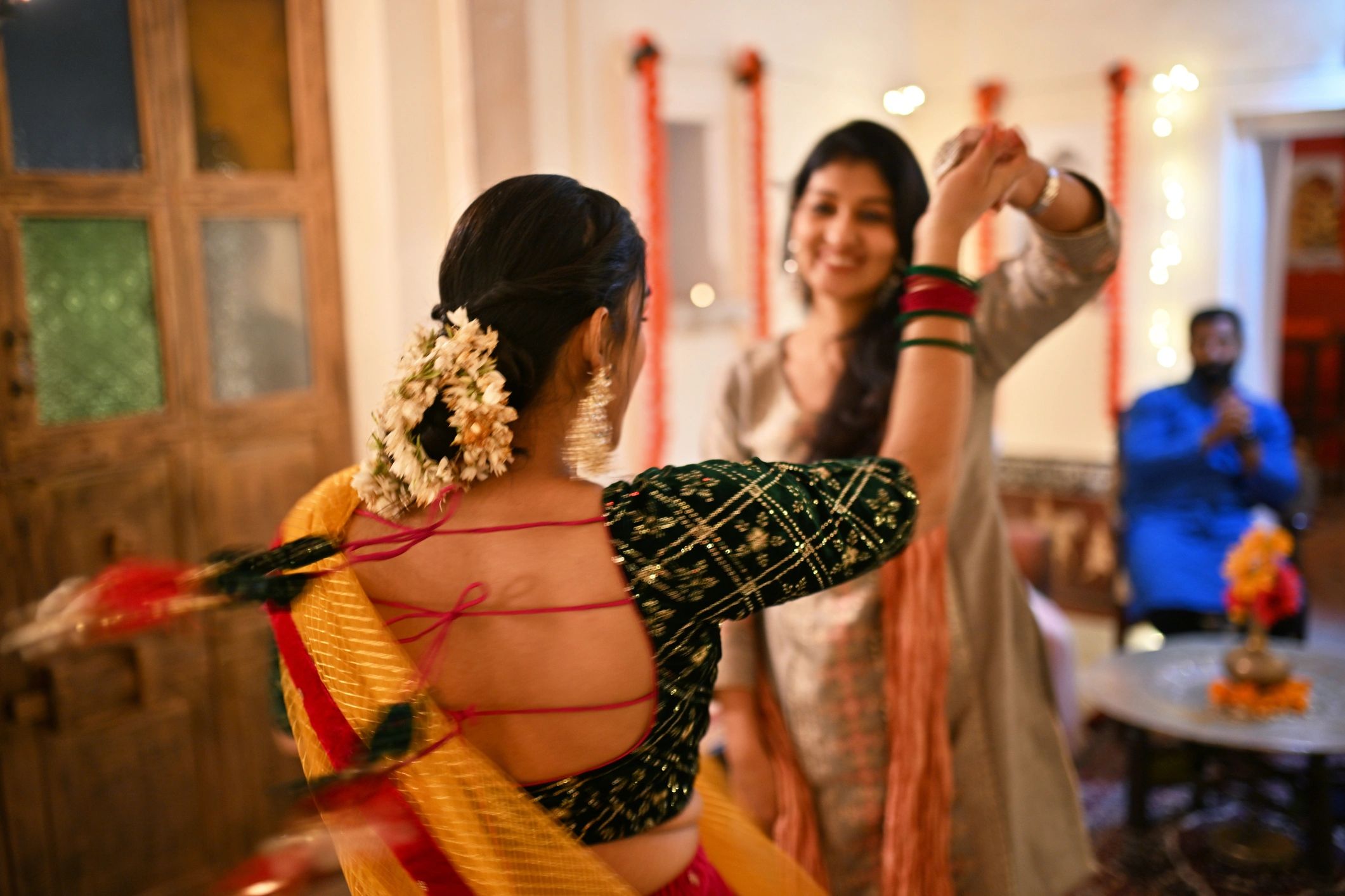 Women dancing during reception celebration