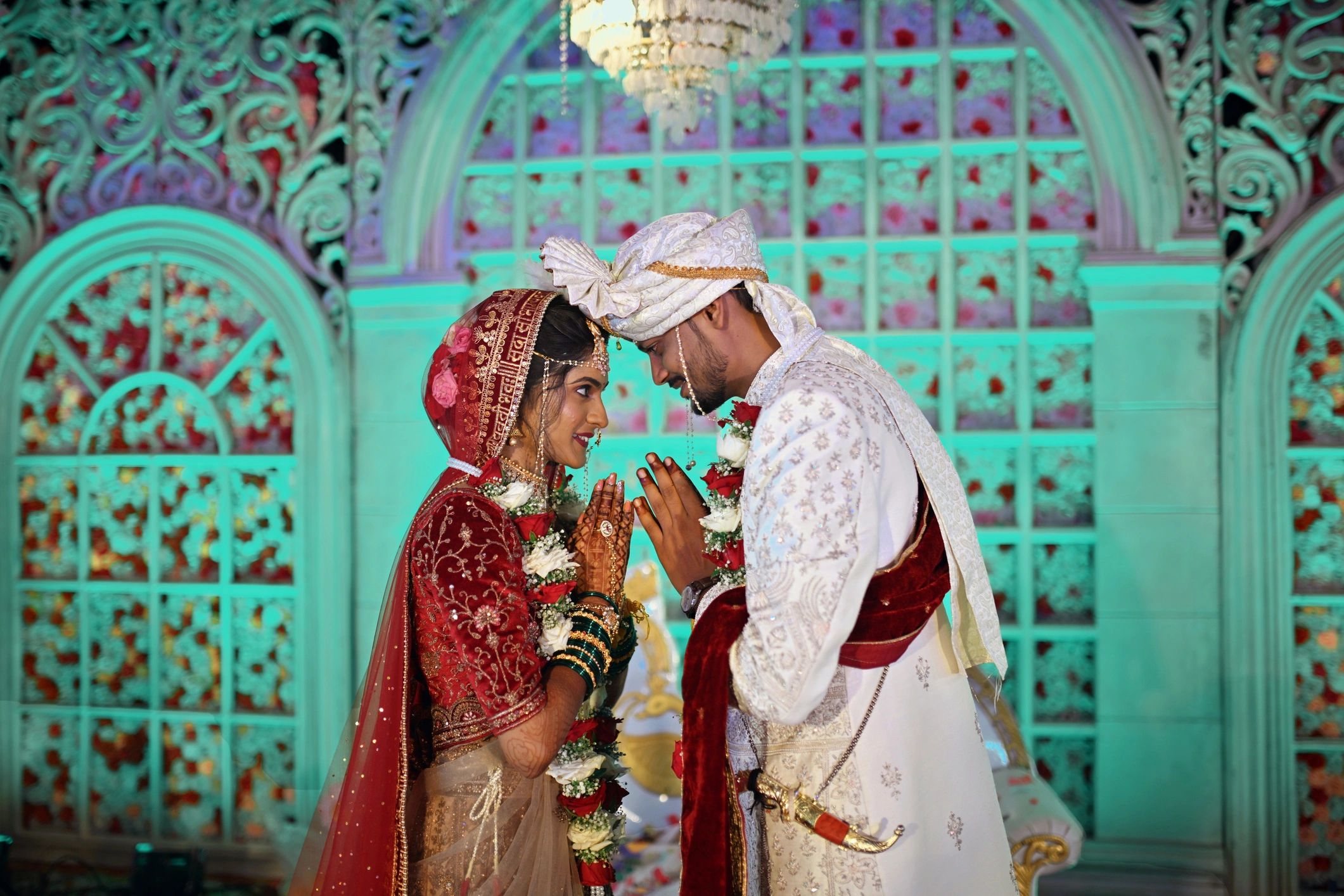 Bride and groom sharing a loving gaze during reception