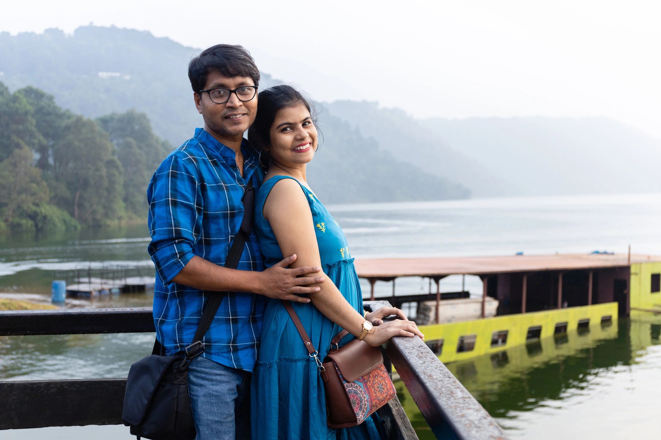 Indian couple enjoying a candid lakeside moment